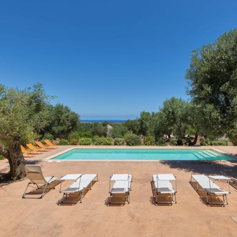 Relax on the sun-drenched terrace as you drink in the sea views