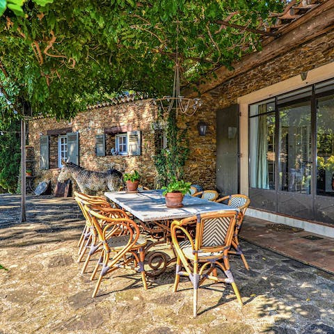 Dine on ratatouille in the garden after exploring the French Riviera
