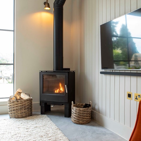 Warm up by the log burner when the Somerset weather turns cooler
