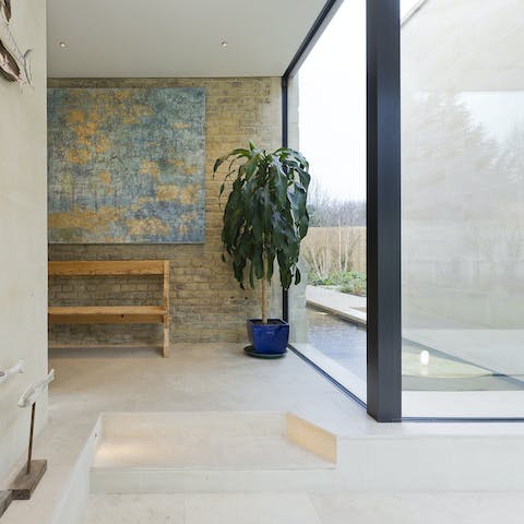 Admire the moat surrounding the Neo-gothic home