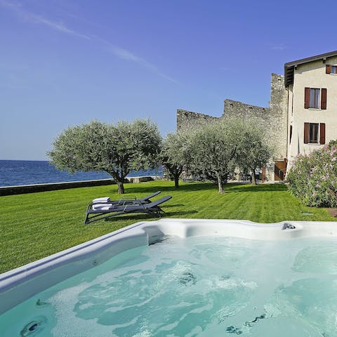 Enjoy the peace of lakeside living from the jacuzzi