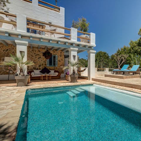 Cool off in the turquoise waters of your own pool