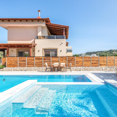 Float under the Greek sunshine in the private pool, or sit and chat in the spa pool