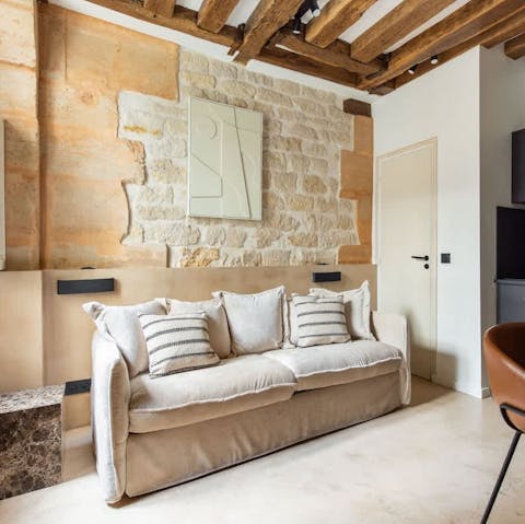 Stretch out on the sofa with a good book or glass of French wine