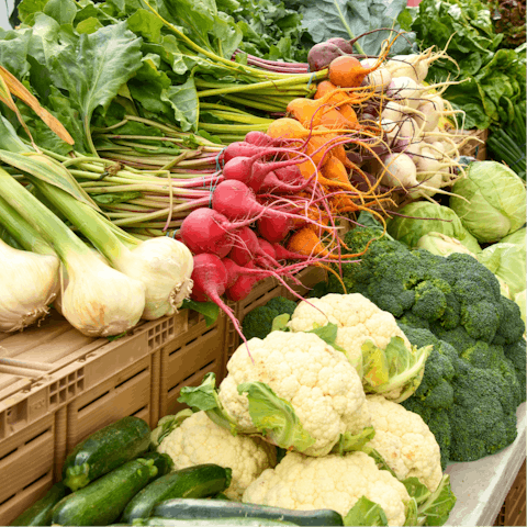 Walk ten minutes to the farmer's market and pick up some fresh ingredients for cooking