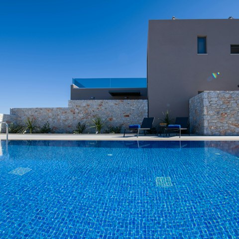 Spend sunny days lounging by the poolside
