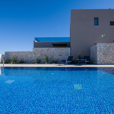 Spend sunny days lounging by the poolside