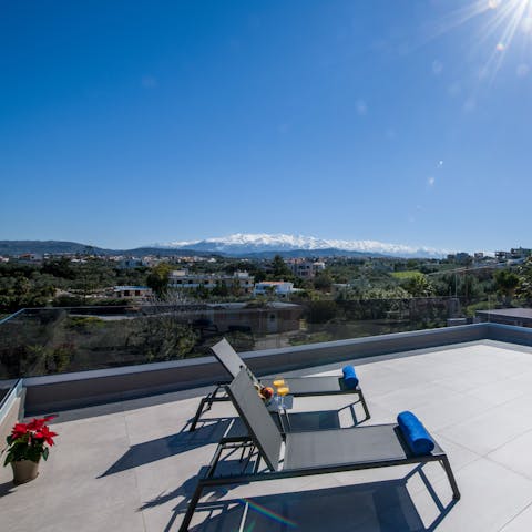 Take in the view of Crete's mountains from the upper terrace