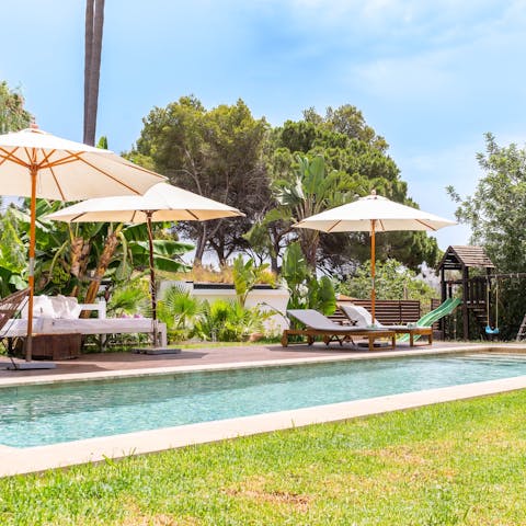 Feel the sun warm your skin from in or beside the private pool