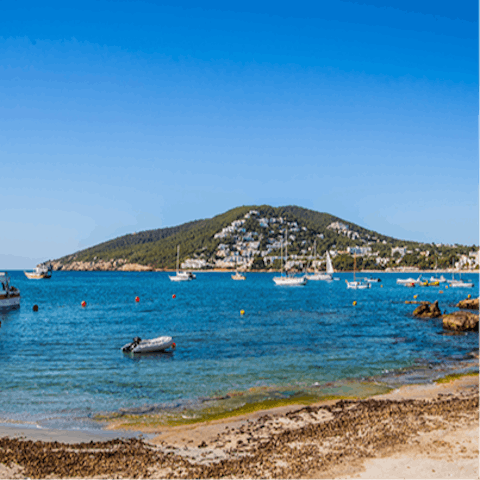 Explore beautiful Santa Eulalia as you marvel at the stunning scenery