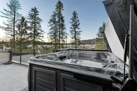 Soak in the Jacuzzi under the Montana sky with mountain views beyond