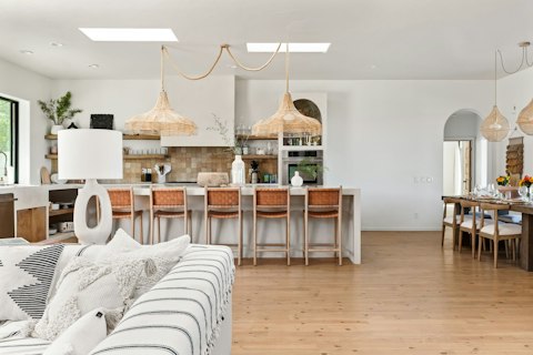Gather in the light-filled kitchen and dining area