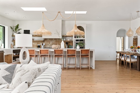 Gather in the light-filled kitchen and dining area