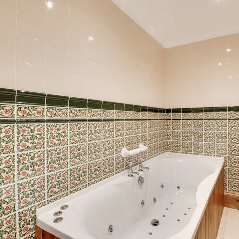 Unwind in the jacuzzi bath tub after a fresh country walk around the farm's grounds