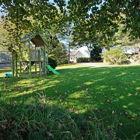 Let the kids play freely in the home's expansive gardens