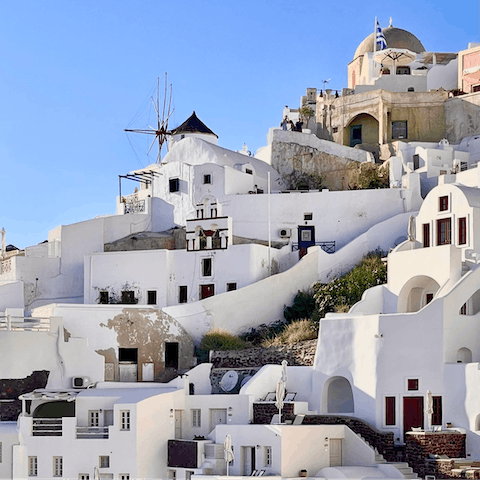 Discover the beautiful beaches and iconic old buildings of Mykonos