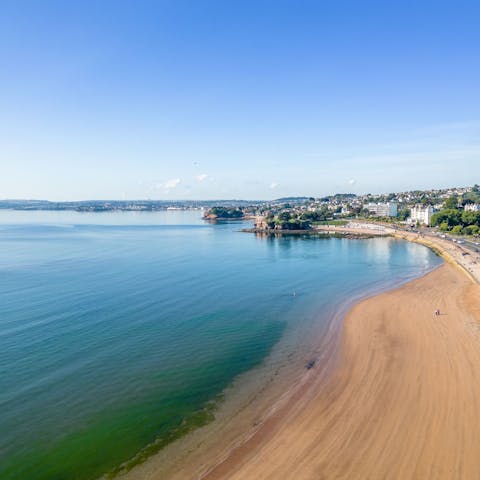 Start the day with an invigorating stroll along Torquay Beach, footsteps from your building