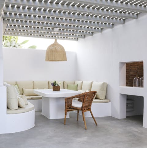 A cosy outdoor nook offers some shade