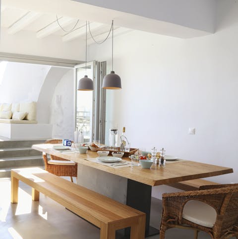 Gather for traditional Greek dinners around the table