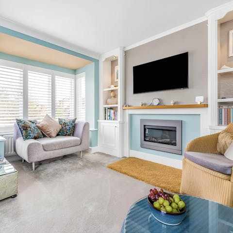 Spend cosy evenings relaxing in the living room