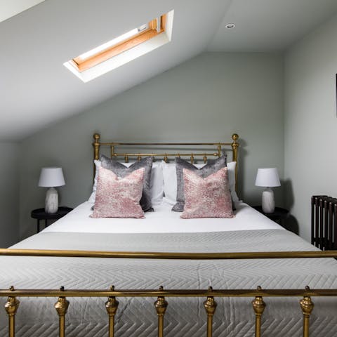 Catch a glimpse of the moon as you fall asleep in your bedroom under the eaves
