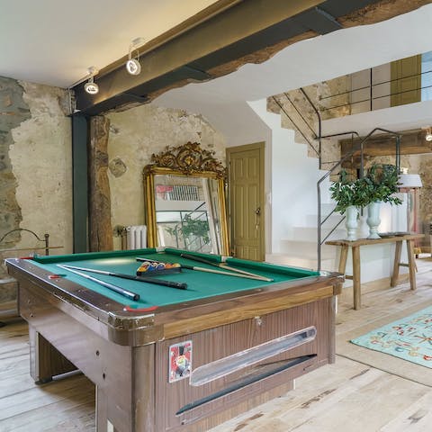 Place a friendly wager on a few games of pool