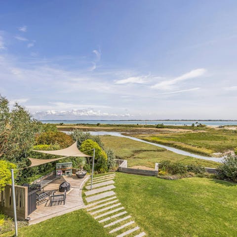 Spend your days in the scenic garden, near the water's edge