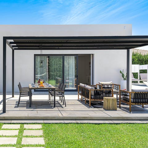Enjoy dinner and drinks alfresco on the pergola terrace