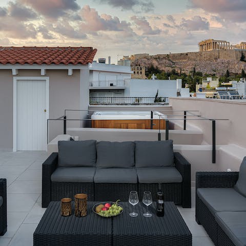 Enjoy a shot of ouzo on the roof terrace