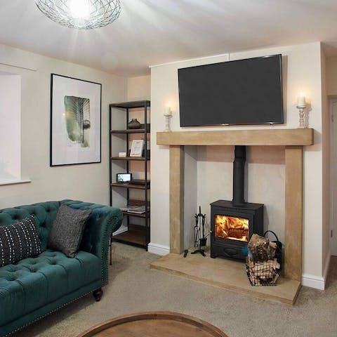 Get cosy and comfortable in front of the wood-burning stove