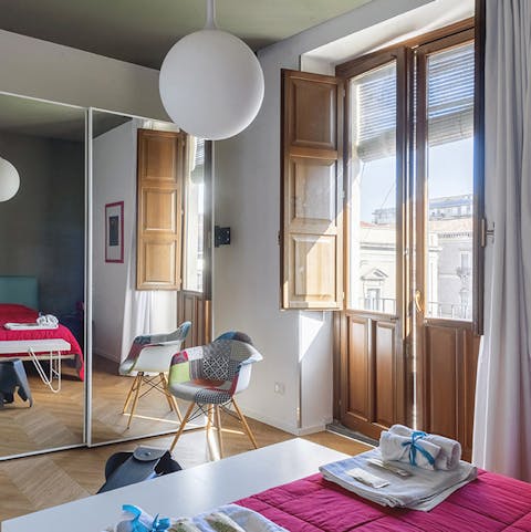 Wake up to daylight streaming in through the balcony door