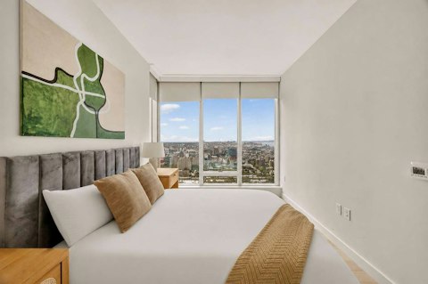 Wake to expansive views stretching across the city