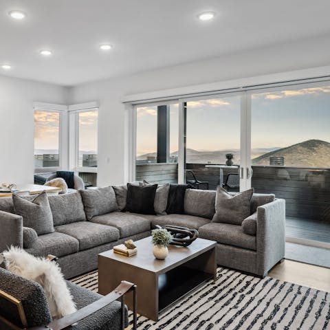 Admire the beautiful mountain views from the living room