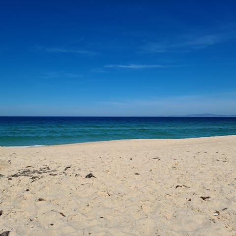 Stroll over to Praia do Vau and splash in the sea