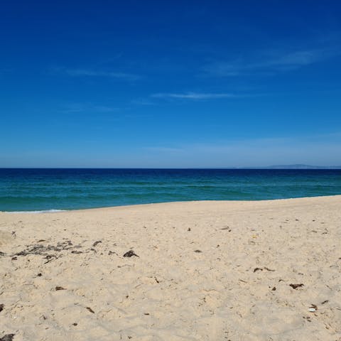 Stroll over to Praia do Vau and splash in the sea