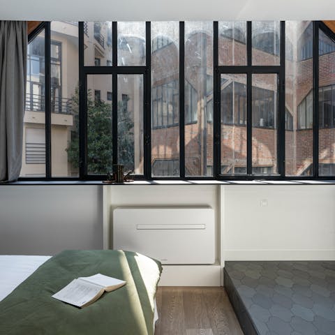 Take in views of the old piano factory from the bedroom