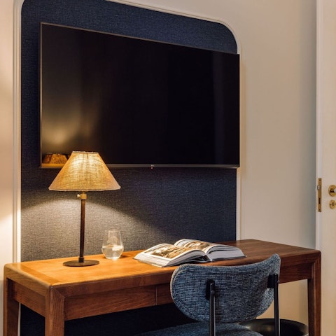 Take advantage of the stylish desk to get some work done
