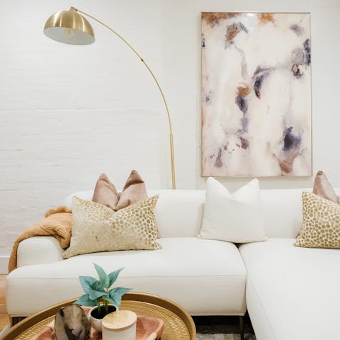 Relax with a copy of the New Yorker on the plush sofa