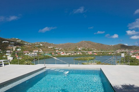 Swim above the lagoon with the St-Jean hills beyond