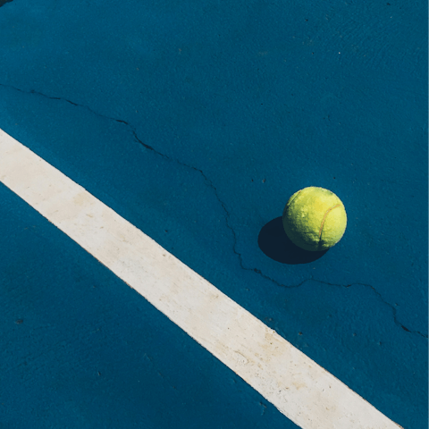 Embrace friendly competition on the private tennis court