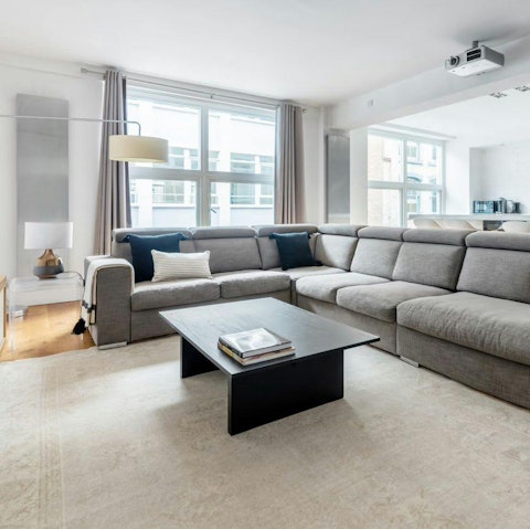 Unwind in the light-filled living area after a busy day of sightseeing