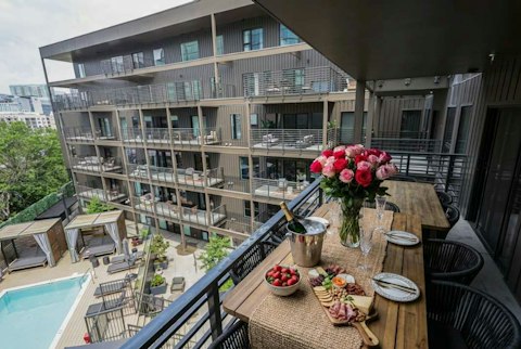 Toast the evening above the shared pool and courtyard