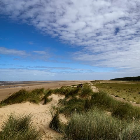 Stroll along the sand of Holkham Beach – it's thirty-three minutes away by car
