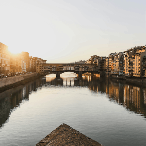Begin your adventure in Florence with a stroll to Ponte Vecchio