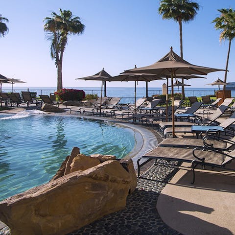 Relax by the pool, cool drink in hand and not a care in the world