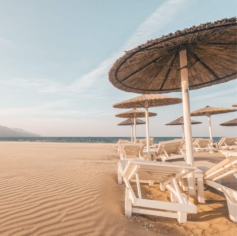 Soak up the sun on Adelianos Kampos beach – it's only a four-minute drive