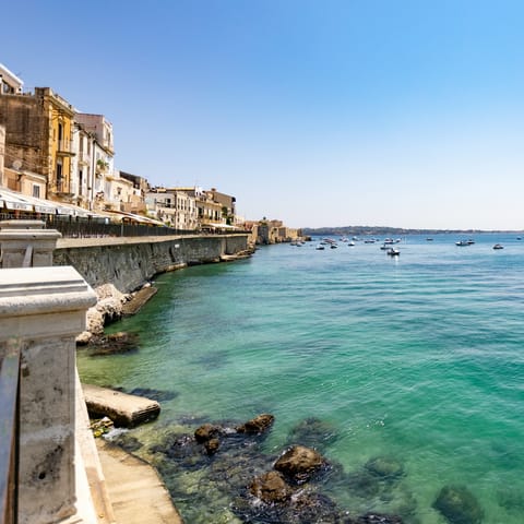 Take a day trip to picturesque Syracuse and swim in the Ionian Sea