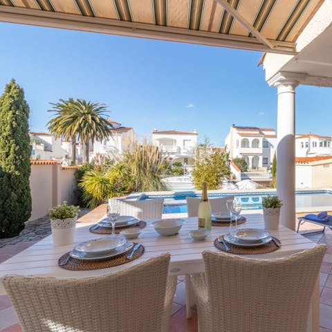 Whip up some tapas and dine alfresco on the covered terrace