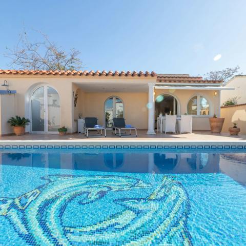 Take a morning dip in the pool then dry off in the sunshine