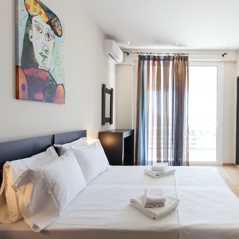 Get some rest in the bedrooms with their modern art prints